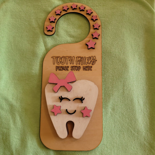 Toith fairy door plaque.